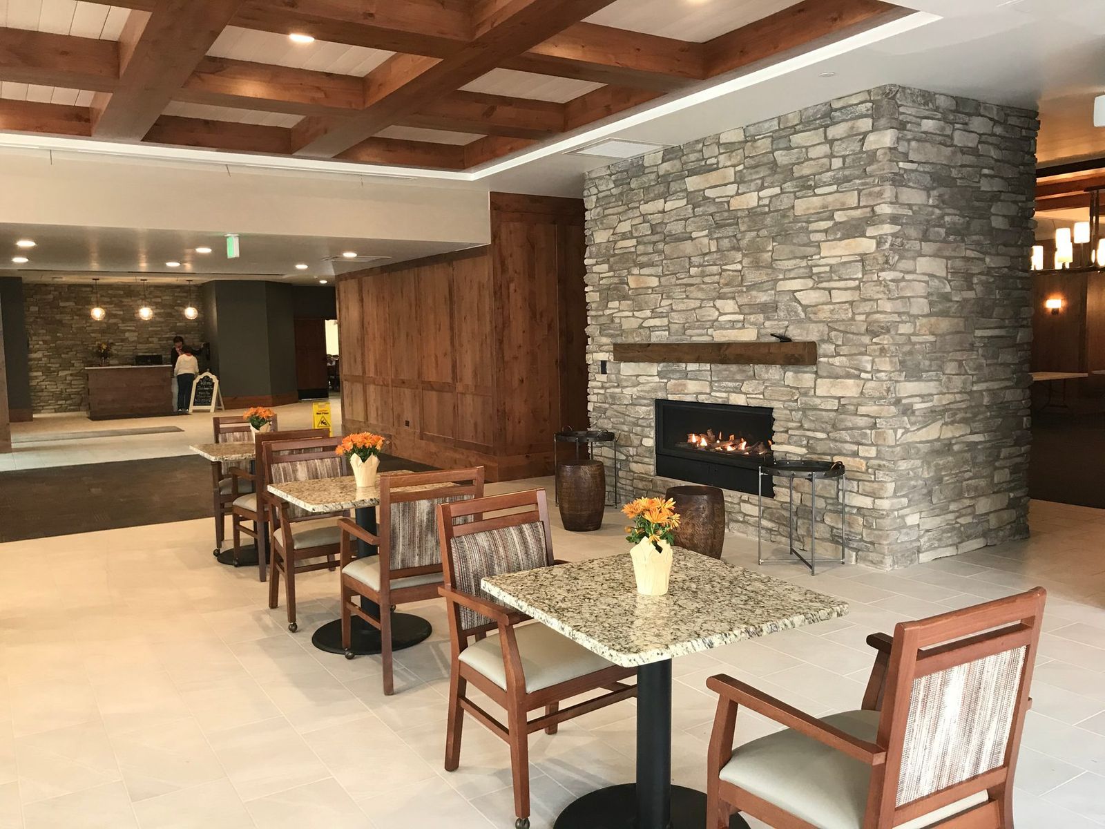 Stacked stone fireplace wall built by Adkins Masonry